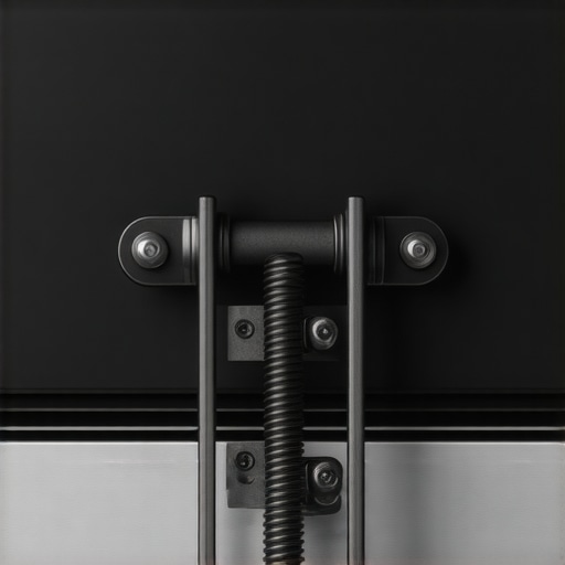 A close-up view of a metal oven door hinge with the safety lock engaged for door removal.